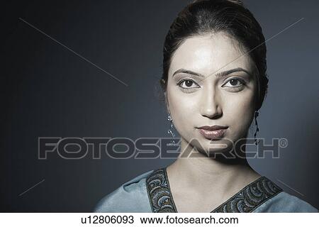 Stock Image - Portrait of a young woman. Fotosearch