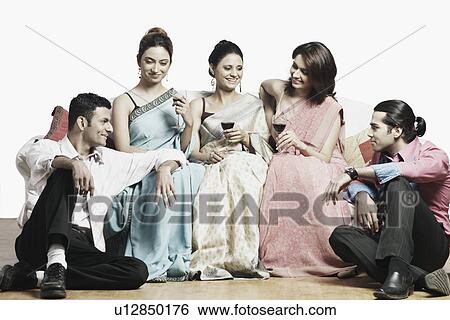 Close-up of three young women and two young men View Large Photo Image Stock Photograph - Close-up of three young women and two young men. Fotosearch