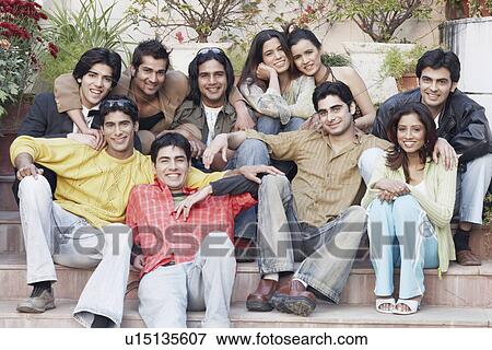 Portrait of a group of people sitting on steps View Large Photo Image Stock Photo - Portrait of a group of people sitting on steps. Fotosearch