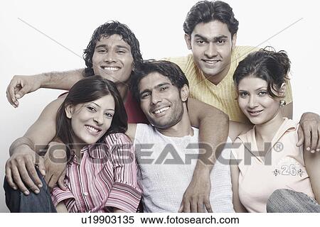 Stock Photography - Portrait of a group of young people smiling. Fotosearch