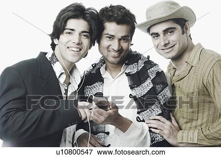 Stock Photo - Portrait of three young men smiling. Fotosearch