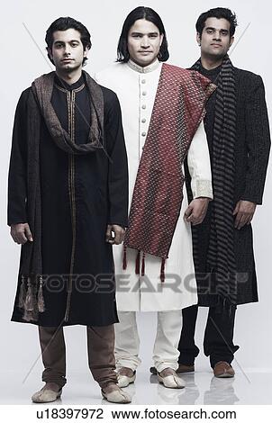 Portrait of three young men wearing wedding outfits View Large Photo Image Stock Image - Portrait of three young men wearing wedding outfits. Fotosearch