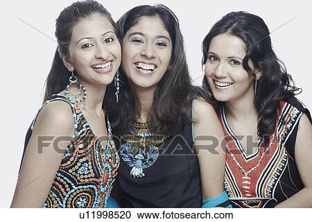 Portrait of three young women smiling View Large Photo Image Stock Image - Portrait of three young women smiling. Fotosearch