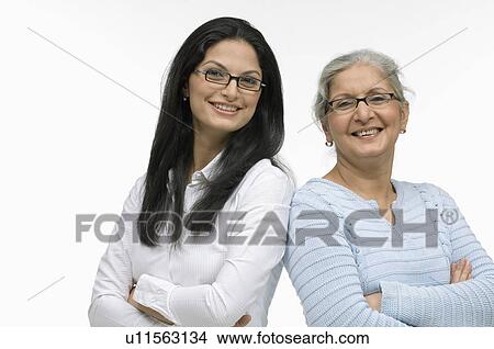 Picture - Portrait of two businesswomen smiling. Fotosearch
