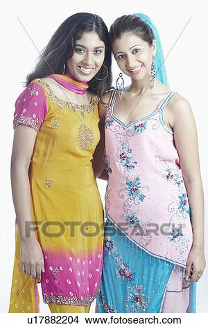 Picture - Portrait of two young women smiling. Fotosearch