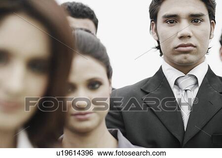 Portrait of a businessman looking serious View Large Photo Image Stock Photograph - Portrait of a businessman looking serious. Fotosearch