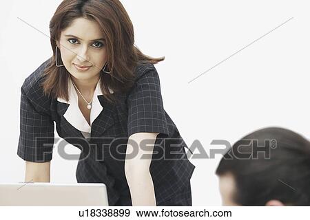 Portrait of a businesswoman smiling View Large Photo Image Stock Photo - Portrait of a businesswoman smiling. Fotosearch