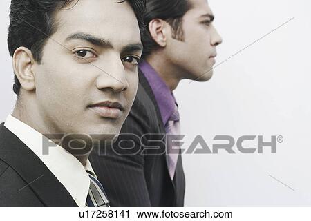 Close-up of two businessmen View Large Photo Image Stock Image - Close-up of two businessmen. Fotosearch