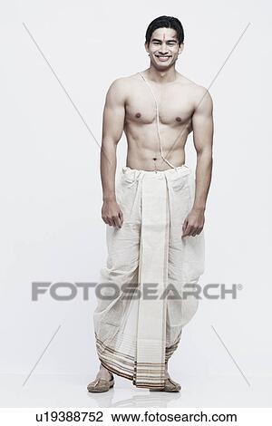 Portrait of a young man in traditional clothing View Large Photo Image Stock Image - Portrait of a young man in traditional clothing. Fotosearch
