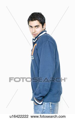Stock Image - Portrait of a young man posing. Fotosearch