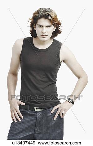 Stock Photo - Portrait of a young man posing. Fotosearch