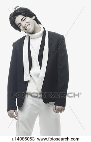 Stock Image - Portrait of a young man smiling. Fotosearch