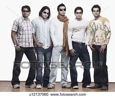 Stock Image - Close-up of five young men wearing sunglasses. Fotosearch