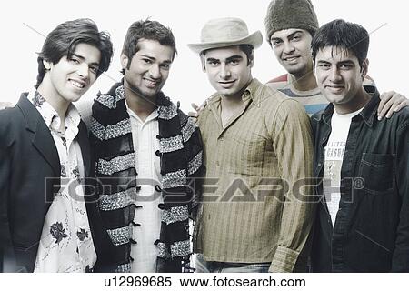 Stock Photography - Portrait of a group of young men smiling. Fotosearch