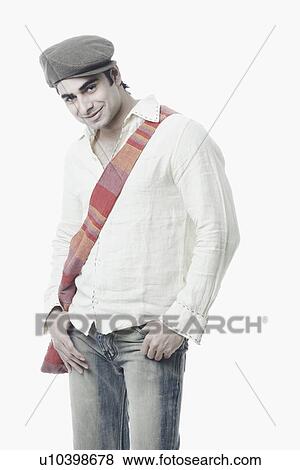 Portrait of a young man posing View Large Photo Image Stock Photo - Portrait of a young man posing. Fotosearch