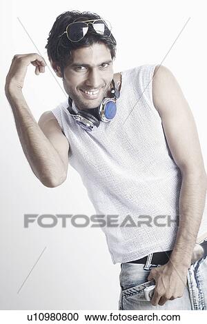 Stock Image - Portrait of a young man smiling. Fotosearch