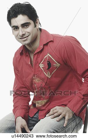 Portrait of a young man smiling View Large Photo Image Stock Image - Portrait of a young man smiling. Fotosearch