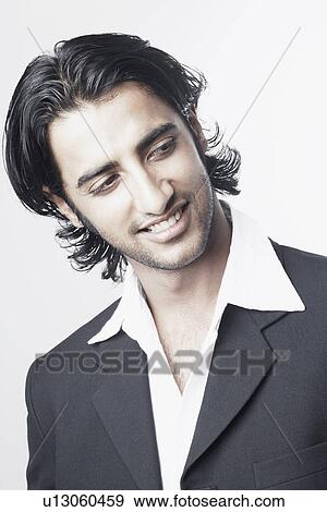 Stock Photo - Close-up of a young man smiling. Fotosearch