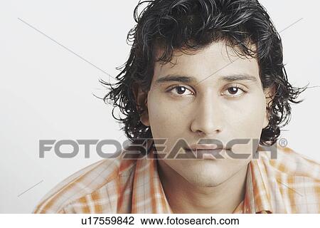 Stock Image - Portrait of a young man. Fotosearch