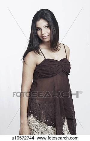 Portrait of a young woman smiling View Large Photo Image Picture - Portrait of a young woman smiling. Fotosearch