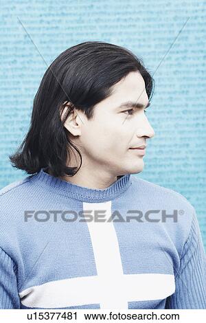 Close-up of a young man smiling View Large Photo Image Stock Image - Close-up of a young man smiling. Fotosearch