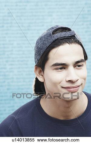 Stock Photography - Close-up of a young man smiling. Fotosearch