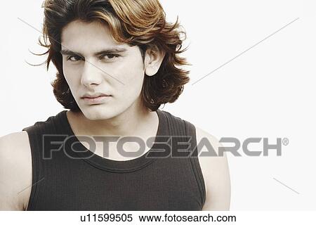 Portrait of a young man smiling View Large Photo Image Stock Photography - Portrait of a young man smiling. Fotosearch