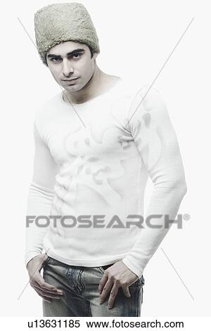 Stock Photography - Portrait of a young man standing. Fotosearch