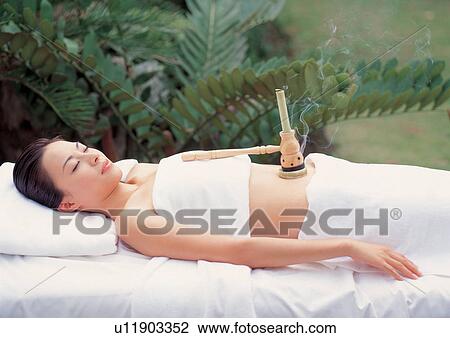 Stock Image - beautification, therapeutic, black hair, body spa, health spa, object, outdoor. Fotosearch