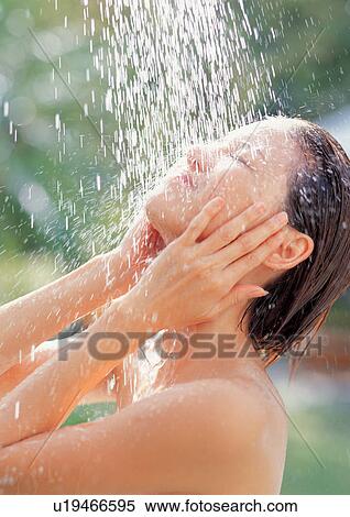 Stock Photography - carefree, freshening, smiling, asian ethnicity, short hair, body conscious. Fotosearch
