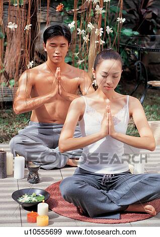 Stock Photo - day, bowl, bare chest, leisure, close-up, meditating, woman. Fotosearch