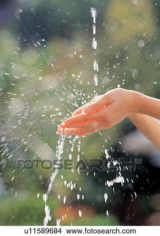 Female washing her hands outside View Large Photo Image Picture - Female washing her hands outside. Fotosearch