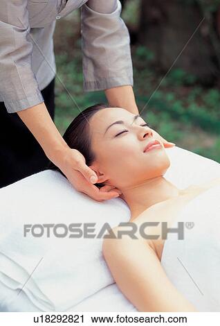 Stock Image - Woman getting a massage . Fotosearch