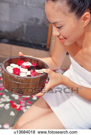 wrapped in towel, young woman, petals, shadow, bathrobe View Large Photo Image Stock Photo - wrapped in towel, young woman, petals, shadow, bathrobe. Fotosearch