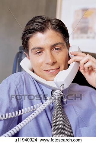 Picture - business people, well dressed, indoor, one person. Fotosearch