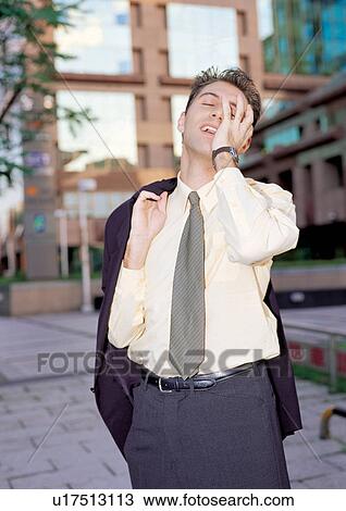 Stock Image - business people, well dressed, suit, outdoor. Fotosearch