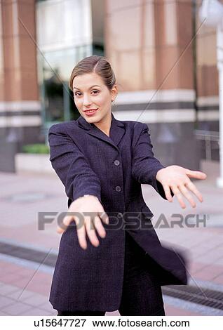 Stock Photo - business people, well dressed, suit, outdoor. Fotosearch