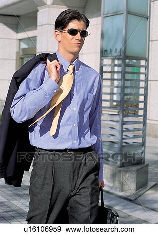 Stock Photo - business people, well dressed, suit, outdoor. Fotosearch