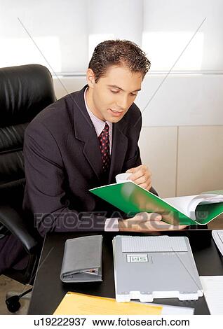 Stock Photo - business people, well dressed, suit, indoor. Fotosearch