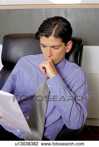 hand on chin, business, indoor, reading, business executive, files View Large Photo Image Stock Image - hand on chin, business, indoor, reading, business executive, files. Fotosearch