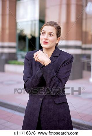Stock Photo - lifestyle, hands clasped, professional, one person, woman only. Fotosearch