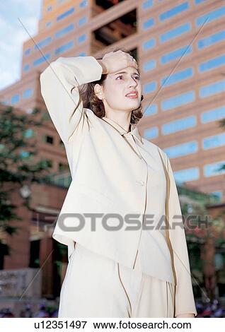 lifestyle, outdoor, headache, hand on head, looking up, one person View Large Photo Image Stock Photo - lifestyle, outdoor, headache, hand on head, looking up, one person. Fotosearch