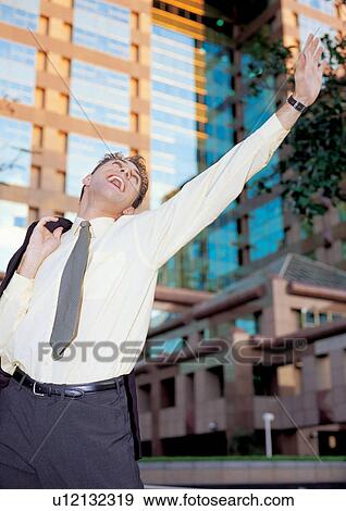 Stock Photo - looking up, one person, business man, career. Fotosearch