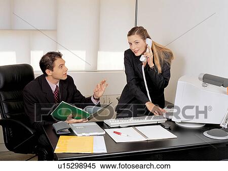 working, helping, assistance, files, office table, documents View Large Photo Image Stock Photography - working, helping, assistance, files, office table, documents. Fotosearch