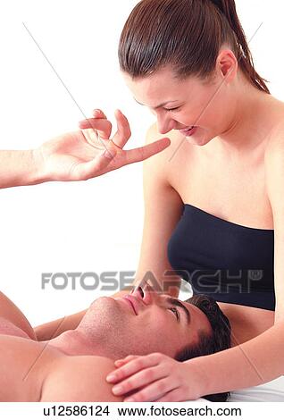 Picture - bare chest, indoor, head and shoulders, two people, smiling. Fotosearch