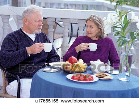Stock Photography - breakfast, outdoor, culture, bonding, head and shoulders, love. Fotosearch