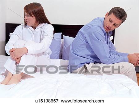 Stock Photo - couples, sitting, indoor. Fotosearch