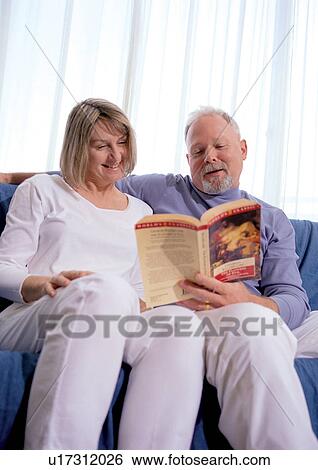 Stock Photograph - couples, sitting, indoor. Fotosearch