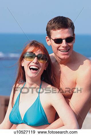 Stock Photo - day, two people, sunlight, leisure activity, nature. Fotosearch