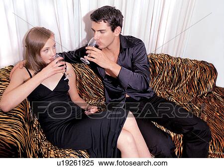 Stock Photography - emotion, side by side, young adult, love, couples, relaxation, carefree. Fotosearch